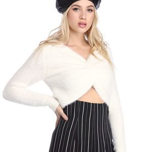 white knot about it sweater